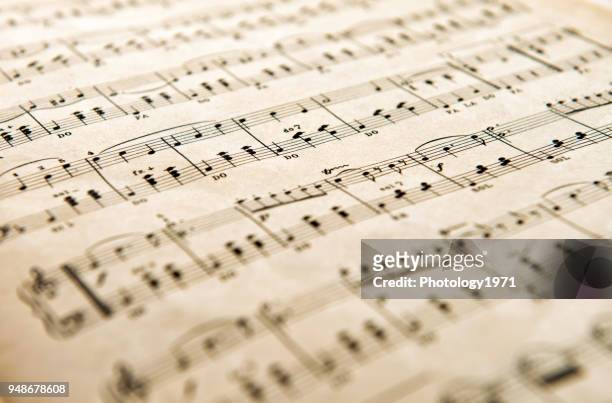 close-up of musical notes on paper - sheet music stock pictures, royalty-free photos & images