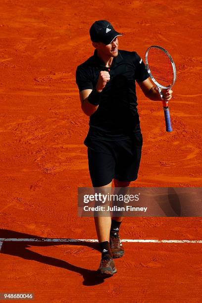 Dominic Thiem of Austria celebrates beating Novak Djokovic of Serbia in his his men's singles 3rd round match on day five of the Rolex Monte-Carlo...