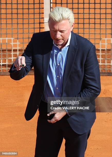 German former tennis player and Boris Becker poses with a hall of fame ring during the Monte-Carlo ATP Masters Series Tournament on April 18, 2018 in...