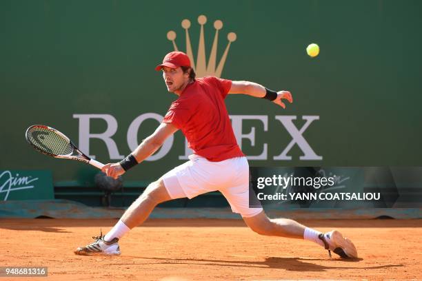 Germany's Mischa Zverev returns the ball to France's Richard Gasquet during their men's single tennis match at the Monte-Carlo ATP Masters Series...