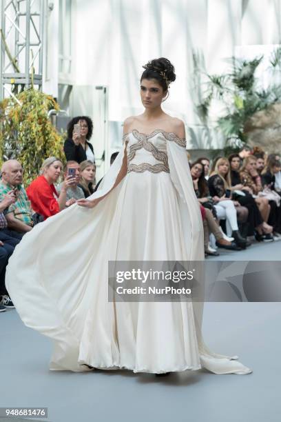 Model walks the runway at the NOEMI VALLONE show during the Madrid Bridal Week 2018 at Palacio de Cibeles on April 19, 2018 in Madrid, Spain