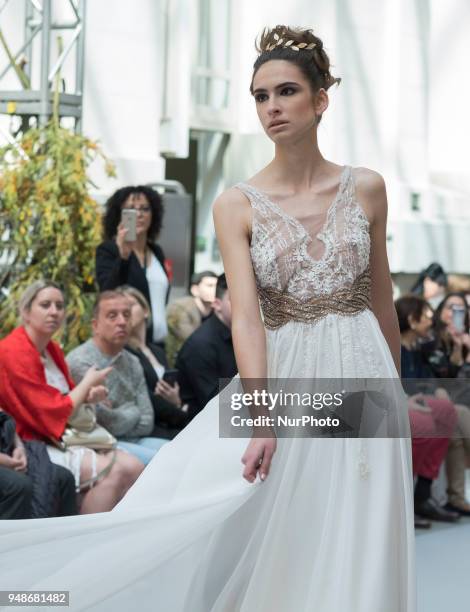 Model walks the runway at the NOEMI VALLONE show during the Madrid Bridal Week 2018 at Palacio de Cibeles on April 19, 2018 in Madrid, Spain