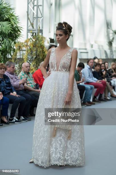Model walks the runway at the NOEMI VALLONE show during the Madrid Bridal Week 2018 at Palacio de Cibeles on April 19, 2018 in Madrid, Spain