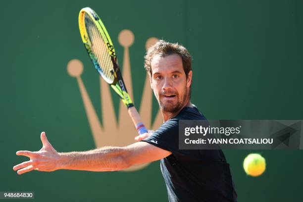 France's Richard Gasquet returns the ball to Germany's Mischa Zverev during their men's single tennis match at the Monte-Carlo ATP Masters Series...