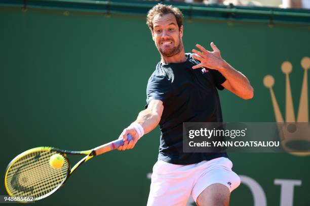 France's Richard Gasquet returns the ball to Germany's Mischa Zverev during their men's single tennis match at the Monte-Carlo ATP Masters Series...