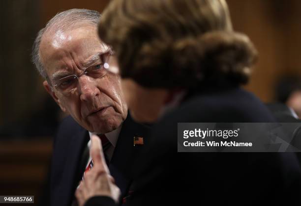 Senate Judiciary Committee Chairman Chuck Grassley confers with ranking member Dianne Feinstein at a Judiciary Committee hearing April 19, 2018 in...