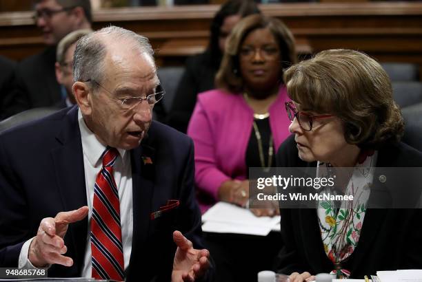 Senate Judiciary Committee Chairman Chuck Grassley confers with ranking member Dianne Feinstein at a Judiciary Committee hearing April 19, 2018 in...