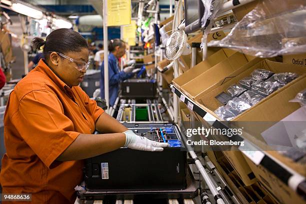 Latasha Bell, a Dell Inc. Employee, assembles a Dell OptiPlex desktop computer at the company's facility in Lebanon, Tennessee, U.S., on Thursday,...