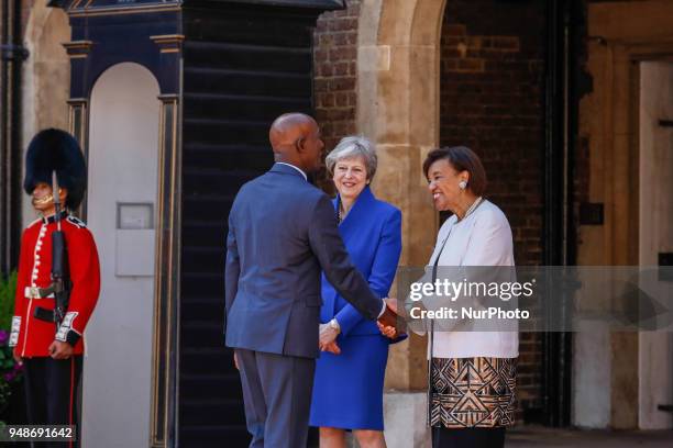 Prime Minister of the United Kingdom, Theresa May and the Commonwealth Secretary General Patricia Scotland welcome Hon Dr Keith Christopher Rowley of...