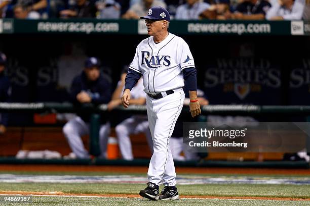 Joe Maddon, manager of the Tampa Bay Rays, walks out to the mound to make a pitching change in the ninth inning of game one of the Major League...