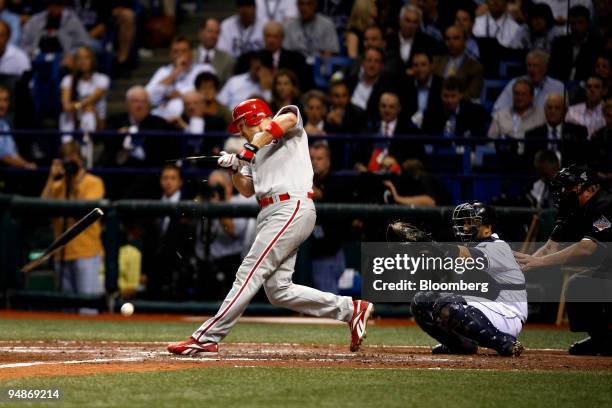 Chris Coste of the Philadelphia Phillies breaks his bat on a ground out to the Tampa Bay Rays in the ninth inning of game one of the Major League...