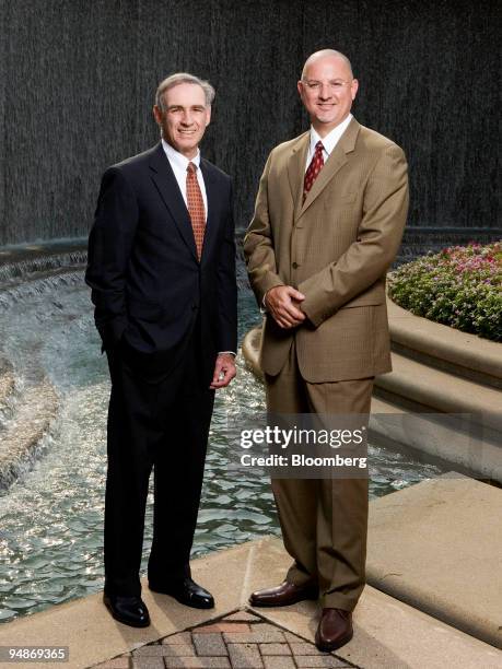 Leonard Briskman, deputy chief for business management for the U.S. Marshals Service, left, and Eben Morales, chief of the asset forfeiture office,...