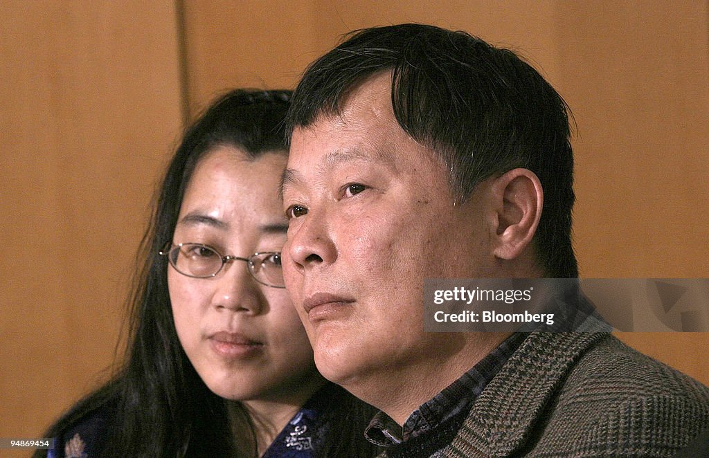 Ciping Huang, left, Secretary General, Overseas Chinese Demo
