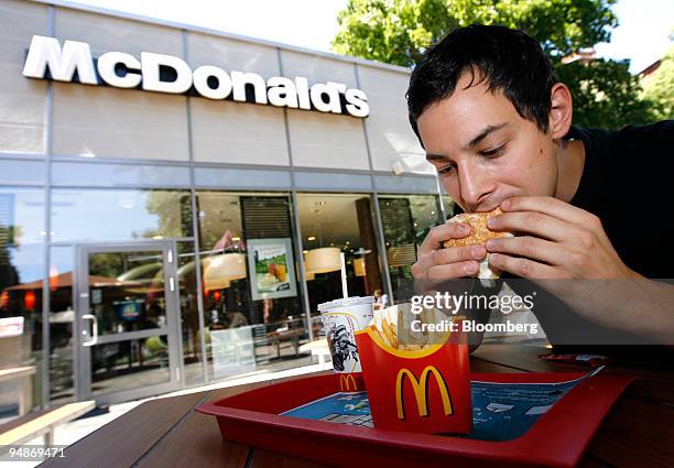 Stefan Nicola eats a Big Mac hamburger at a McDonald's fast-food restaurant franchise in the Kreuzberg neighborhood of Berlin, Germany, on Monday,...