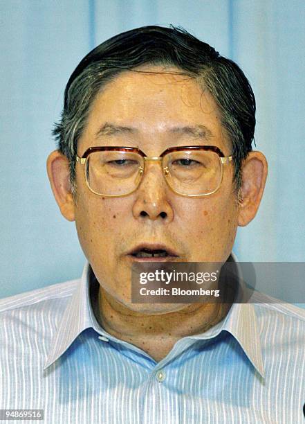 Nippon Keidanren Chairman and Toyota Motor Corp. Chairman Hiroshi Okuda speaks to reporters during a press briefing at the Keidanren in Tokyo,...