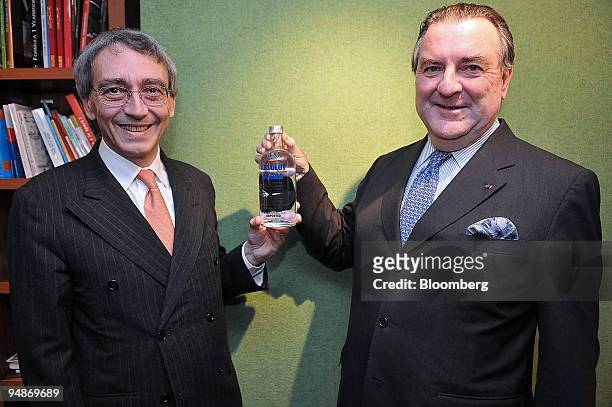 Pierre Pringuet, left, managing director and Patrick Ricard, chairman and chief executive officer of Pernod Ricard SA, pose prior to a news...