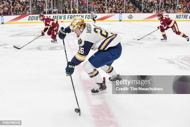 Cam Morrison of the Notre Dame Fighting Irish skates down ice against the Minnesota-Duluth Bulldogs during the Division I Men's Ice Hockey Semifinals...