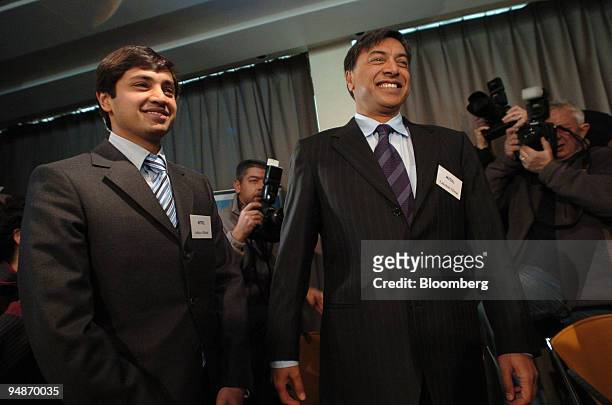 Aditya Mittal, group financial officer, left, poses with Lakshmi Mittal, chairman and chief executive of Mittal Steel Co., at a press conference in...