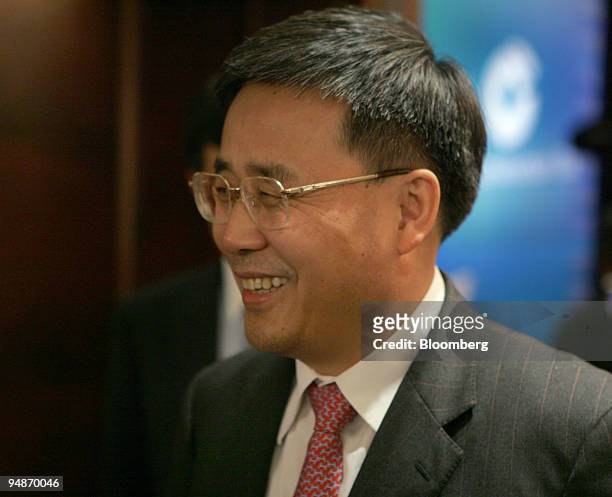 China Construction Bank Chairman Guo Shuqing leaves an IPO pricing meeting at a Hong Kong hotel Tuesday, October 4, 2005. China's third-biggest bank...
