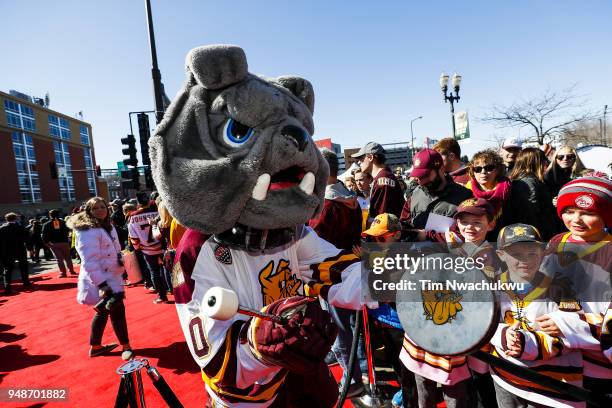 University of Minnesota Duluth mascot, Champ, pumps up the crowd prior to the Division I Men's Ice Hockey Championship held at on April 7, 2018 in St...