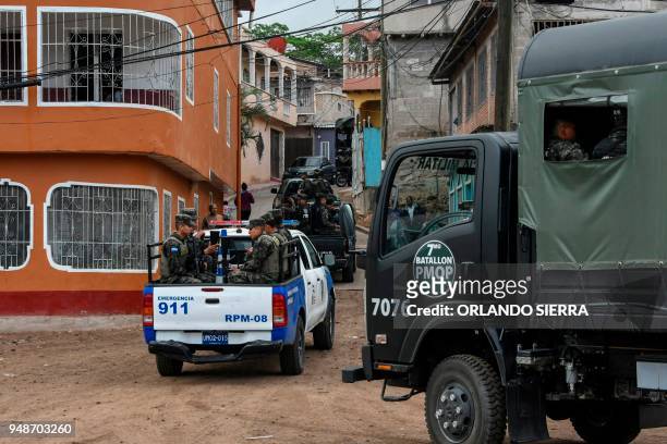 Military and national police officers are deployed in Tegucigalpa on April 18, 2018 to provide security around education facilities. - Students are...