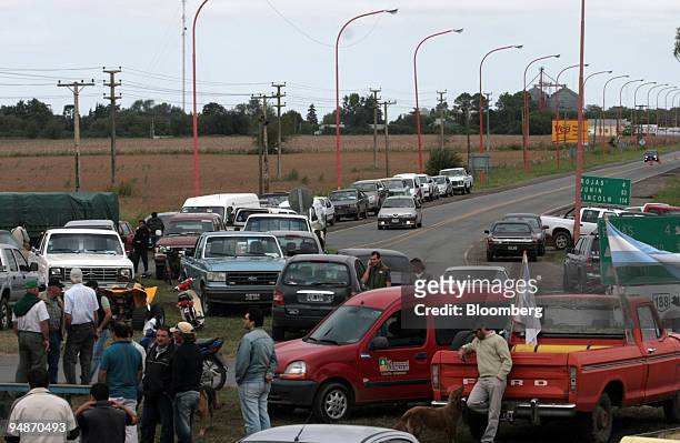 Farmers block a crossroad in Rojas, 160 miles from Buenos Aires, Argentina, on Friday, March 28, 2008. Argentine officials are meeting farmers today...