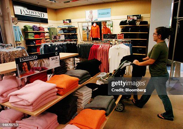 Amanda Santana walks through the apparel section in a Sears store in El Cajon, California on Thursday, October 21, 2004. Sears, Roebuck & Co., the...