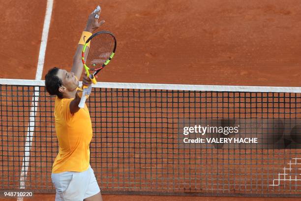 Spain's Rafael Nadal celebrates after winning his men's singles tennis match against Russia's Karen Khachanov at the Monte-Carlo ATP Masters Series...