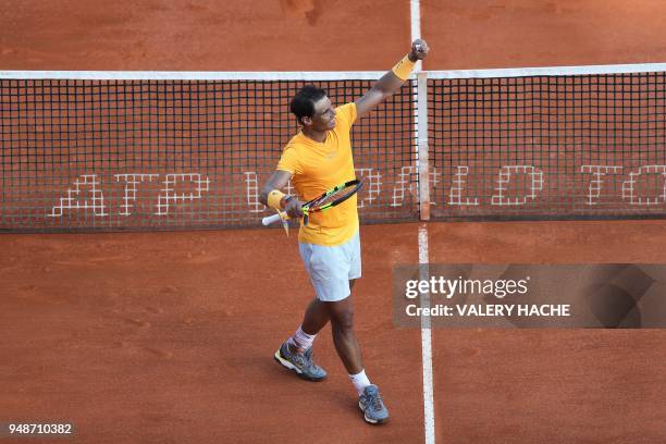 Spain's Rafael Nadal celebrates after winning his men's single tennis match against Russia's Karen Khachanov at the Monte-Carlo ATP Masters Series...