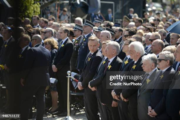 People are seen attending the 75th anniversary of the Warsaw Ghetto Uprising at the Ghetto Heroes Monument on April 19, 2018 in Warsaw, Poland.