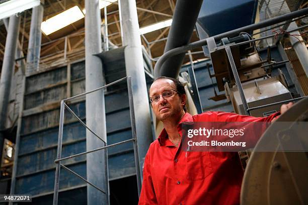 Luis Mesalles, manager with La Yema Dorada, poses for a portrait in the corn and soybean feed mixing warehouse in Pavas, Costa Rica, on Wednesday,...