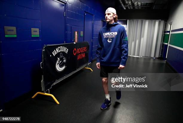 Adam Gaudette of the Vancouver Canucks walks to the Canucks dressing room before their NHL game against the Arizona Coyotes at Rogers Arena April 5,...
