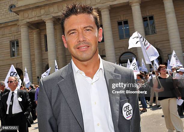 Eric Pigal, a senior manager at Accenture, poses during a demonstration by the Confederation francaise de l'encadrement-Confederation generale des...