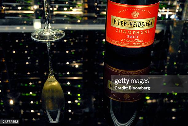 Bottle of champagne sits on display at the Piper-Heidsieck champagne factory, owned by Remy-Cointreau, in Reims, France, on Monday, July 21, 2008....