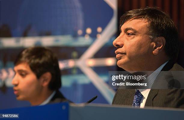 Lakshmi Mittal, right, chairman and chief executive officer at Mittal Steel Co. And Aditya Mittal, president and chief financial officer speak at a...