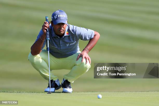 Anirban Lahiri of India looks over a putt on the first hole during the first round of the Valero Texas Open at TPC San Antonio AT&T Oaks Course on...