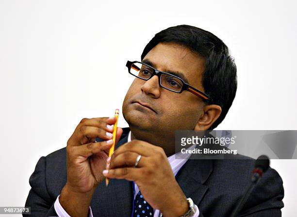 Avinash Persaud, chairman of Intelligence Capital Ltd., speaks during a panel discussion at the annual meetings of the International Monetary Fund...