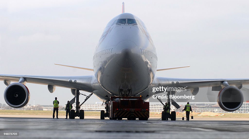 A Virgin Atlantic Boeing 747 jumbo jet sits in a hanger prio