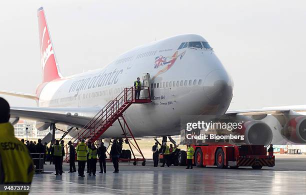 Virgin Atlantic Boeing 747 jumbo jet sits in a hanger prior to takeoff at Heathrow International Airport in London, U.K., on Sunday, Feb. 24, 2008....