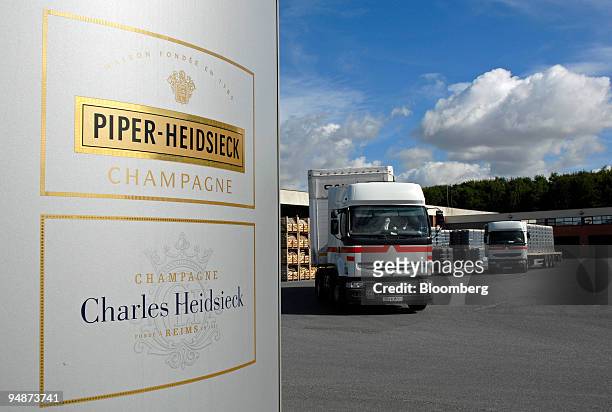 Trucks leaves with a shipment of Champagne at the Piper-Heidsieck champagne factory, owned by Remy-Cointreau, in Reims, France, on Monday, July 21,...