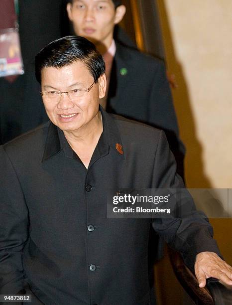 Thongloun Sisoulit, Laos's minister of foreign affairs, walks through the lobby of the Shangri-La Hotel during the 41st Association of Southeast...