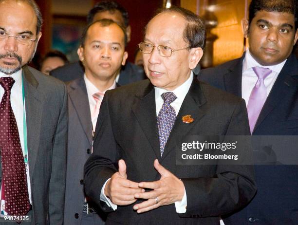 Rais Yatim, Malaysia's foreign minister, center, arrives at the Association of Southeast Asian Nations foreign ministers' meeting with the high-level...
