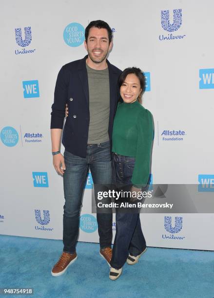 Drew Scott and Linda Phan attend WE Day California at The Forum on April 19, 2018 in Inglewood, California.