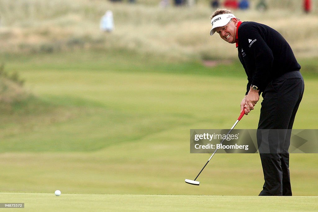 Colin Montgomerie of Scotland putts on the 15th green during
