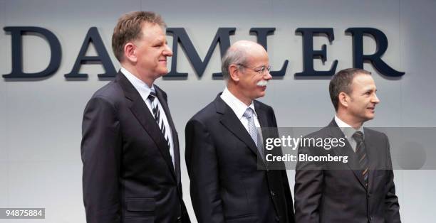 Daimler AG executive board members, left to right, Andreas Renschler, head of the company's truck unit, Dieter Zetsche, chief executive officer and...