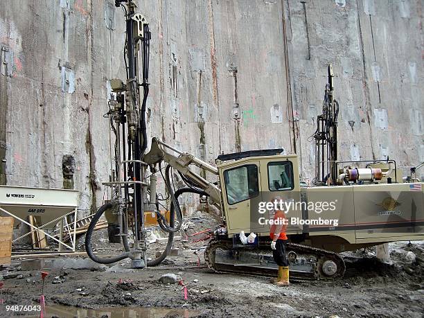 Construction worker uses a drill on the foundation for WTC Tower 4 at the World Trade Center site in New York, U.S., on Thursday, June 26, 2008. The...