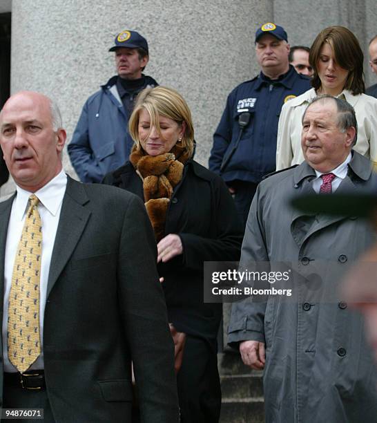 Martha Stewart, second from left, leaves Manhattan Federal Court in New York on March 5, 2004. Also seen are her bodyguard Frank Senerchia, left,...