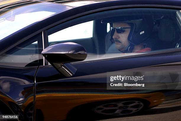 Phil Trupiano drives a Lamborghini Gallardo during the Supercar Life driving program at Homestead Miami Speedway in Homestead, Florida, U.S., on...