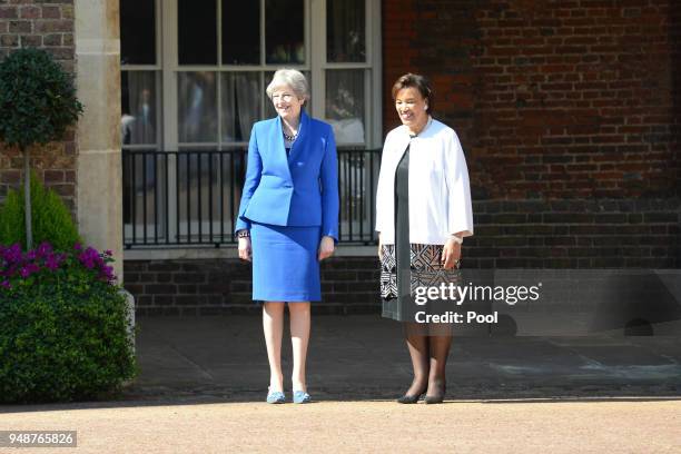 Prime Minister of the United Kingdom, Theresa May and the Commonwealth Secretary General Patricia Scotland wait to welcome guests at St. James's...