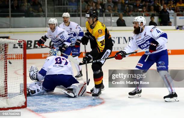 Oliver Mebus of Germany scores the opening goal during the Icehockey International Friendly match between Germany and France at BraWo Eis Arena on...